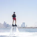 Beginner learning to flyboard in Dubai with Hydro Water Sports