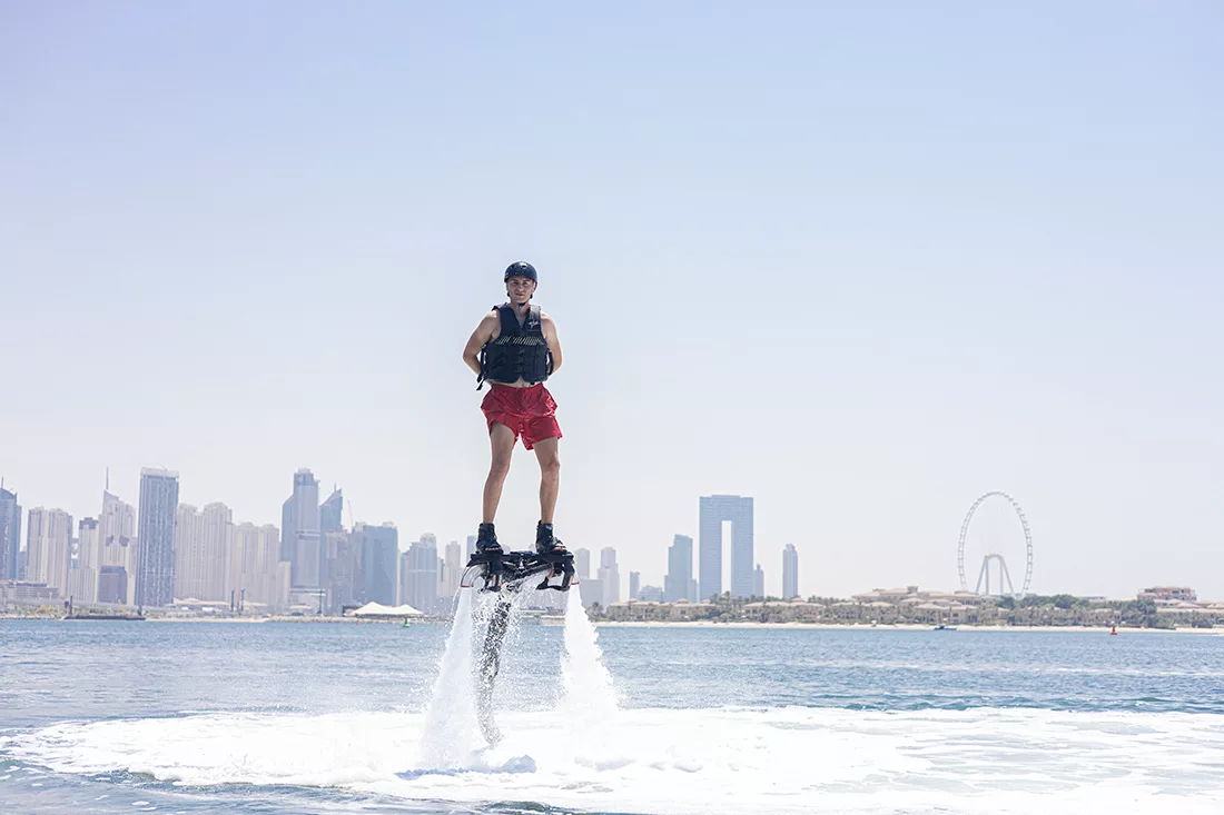 Beginner learning to flyboard in Dubai with Hydro Water Sports