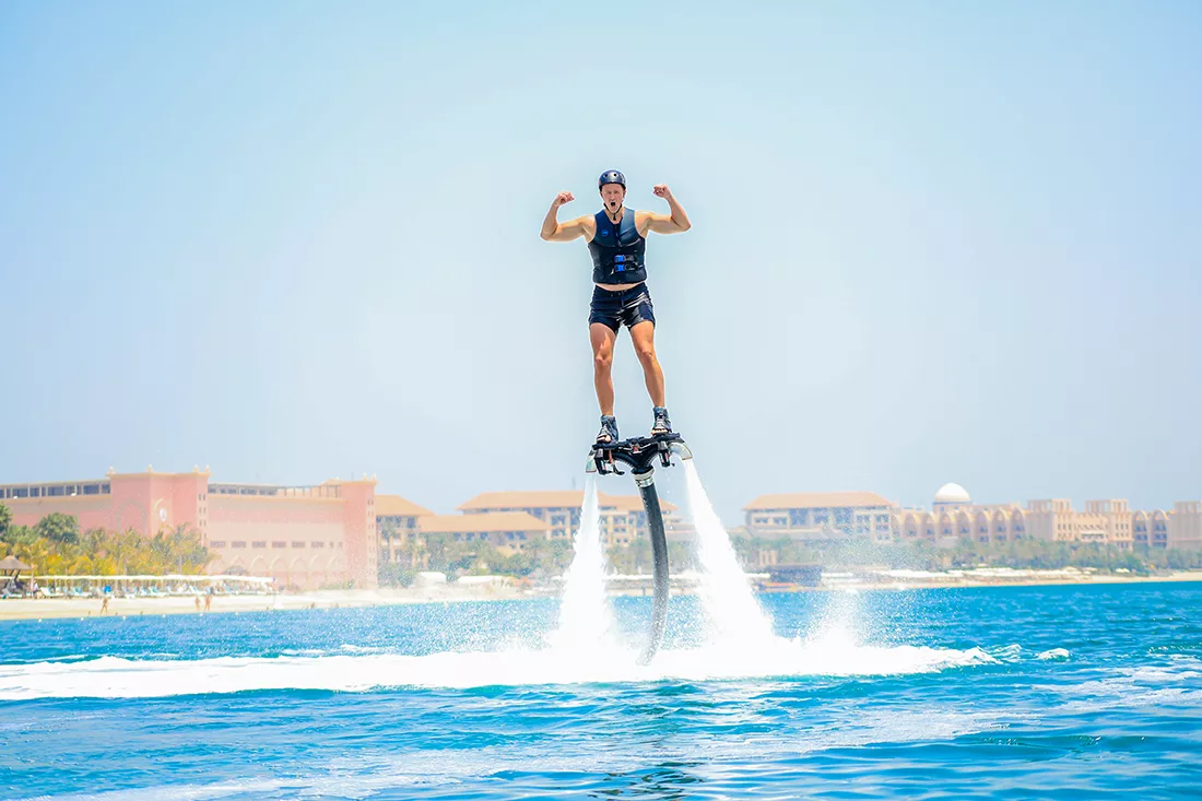 Beginner learning to flyboard in Dubai with Hydro Water Sports