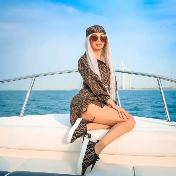 Lady enjoying a mini yacht cruise in Dubai