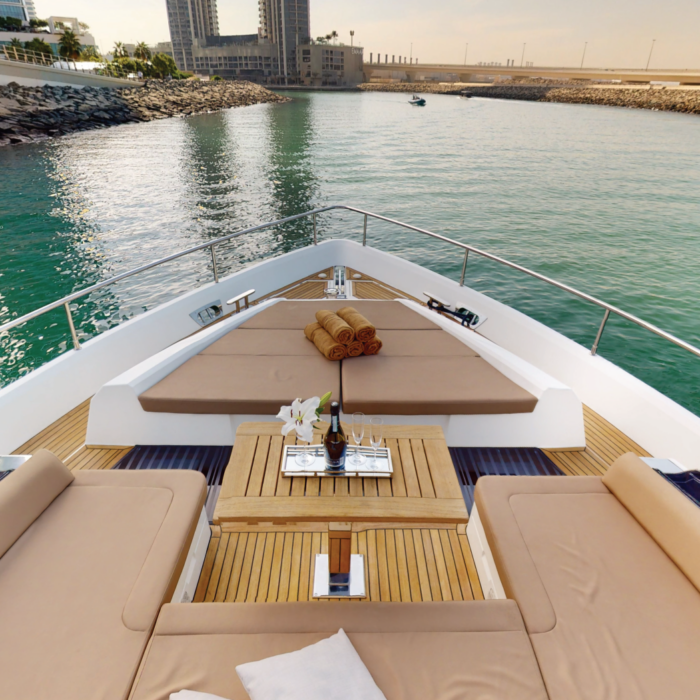 Spacious deck of a 78ft yacht for guests to enjoy panoramic views of Dubai’s skyline