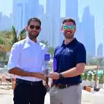 Mahmoud Torky and Joe Gates of Hydro Sports Group holding Best Sustainable Water Sports Provider 2025 award in One&Only Royal Mirage